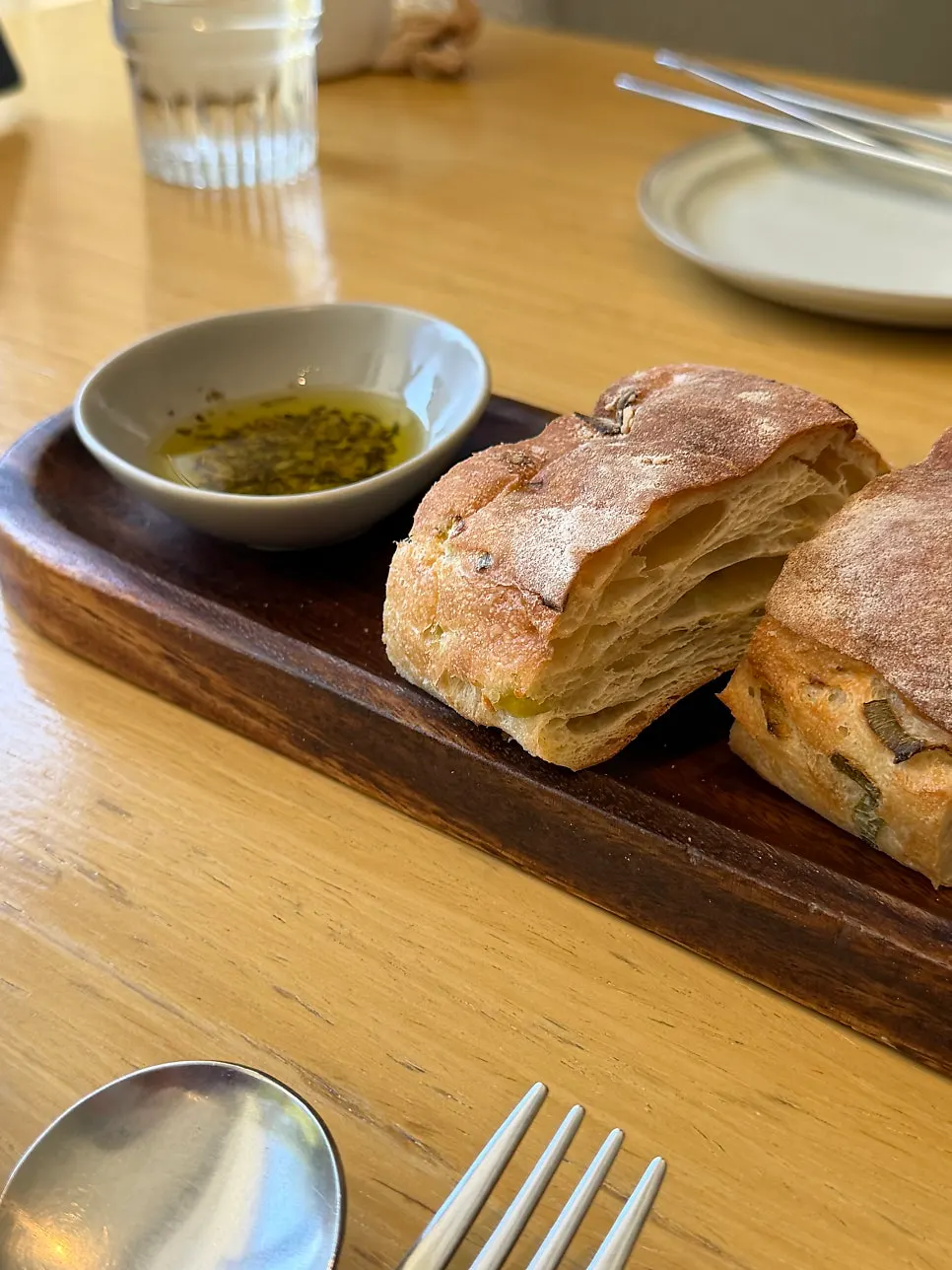 Dipping bread into the oil