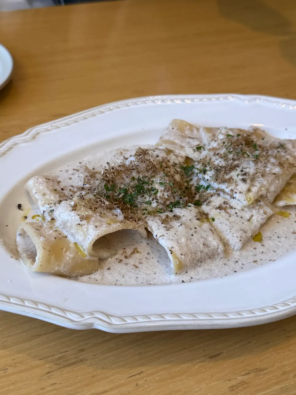 A plate of mushroom truffle cream pasta