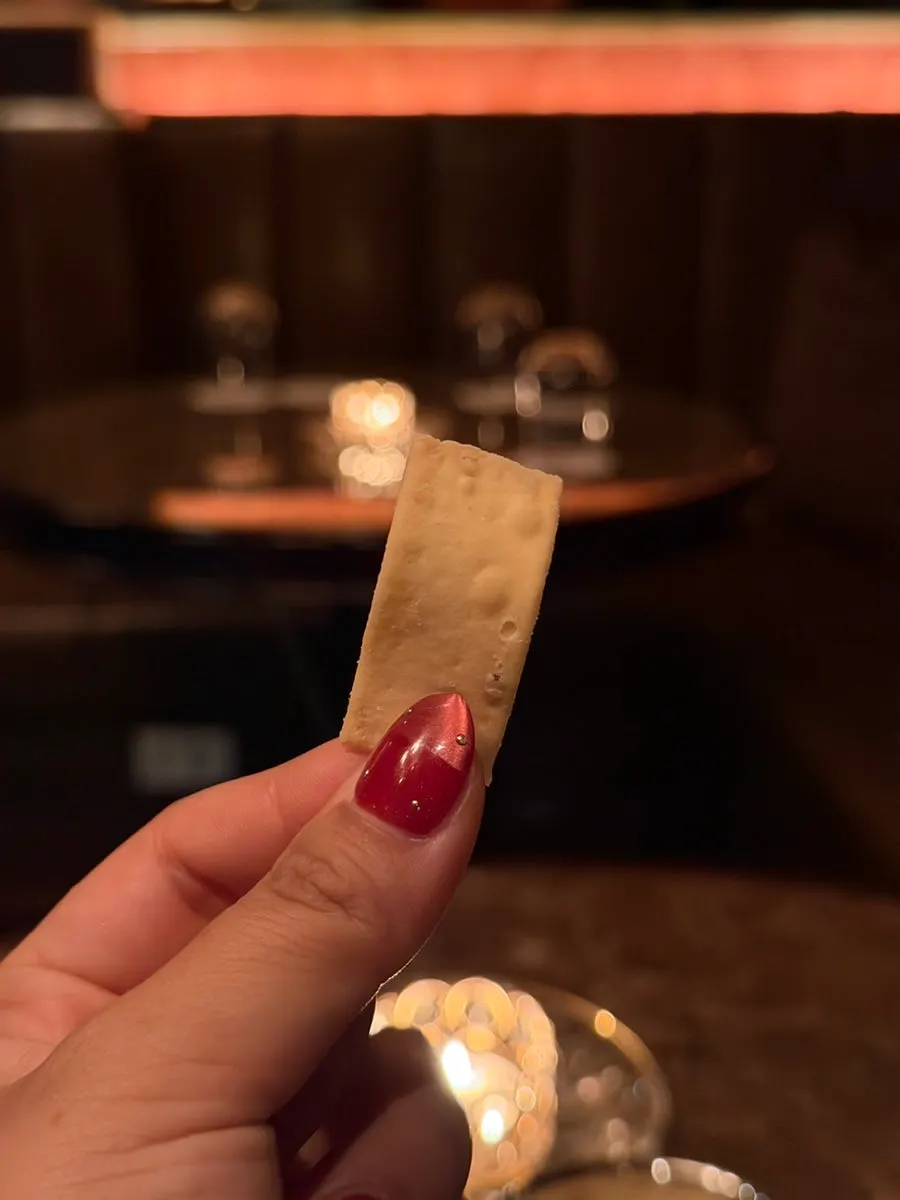 Table setting with a plate of tofu chips
