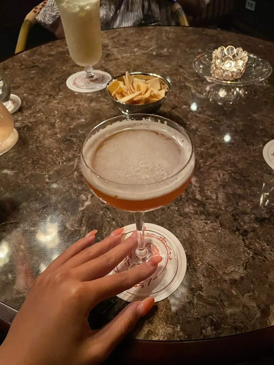 A glass of Sidecar on the table