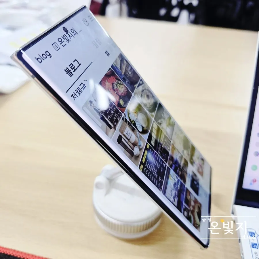 White smartphone mount for a desk