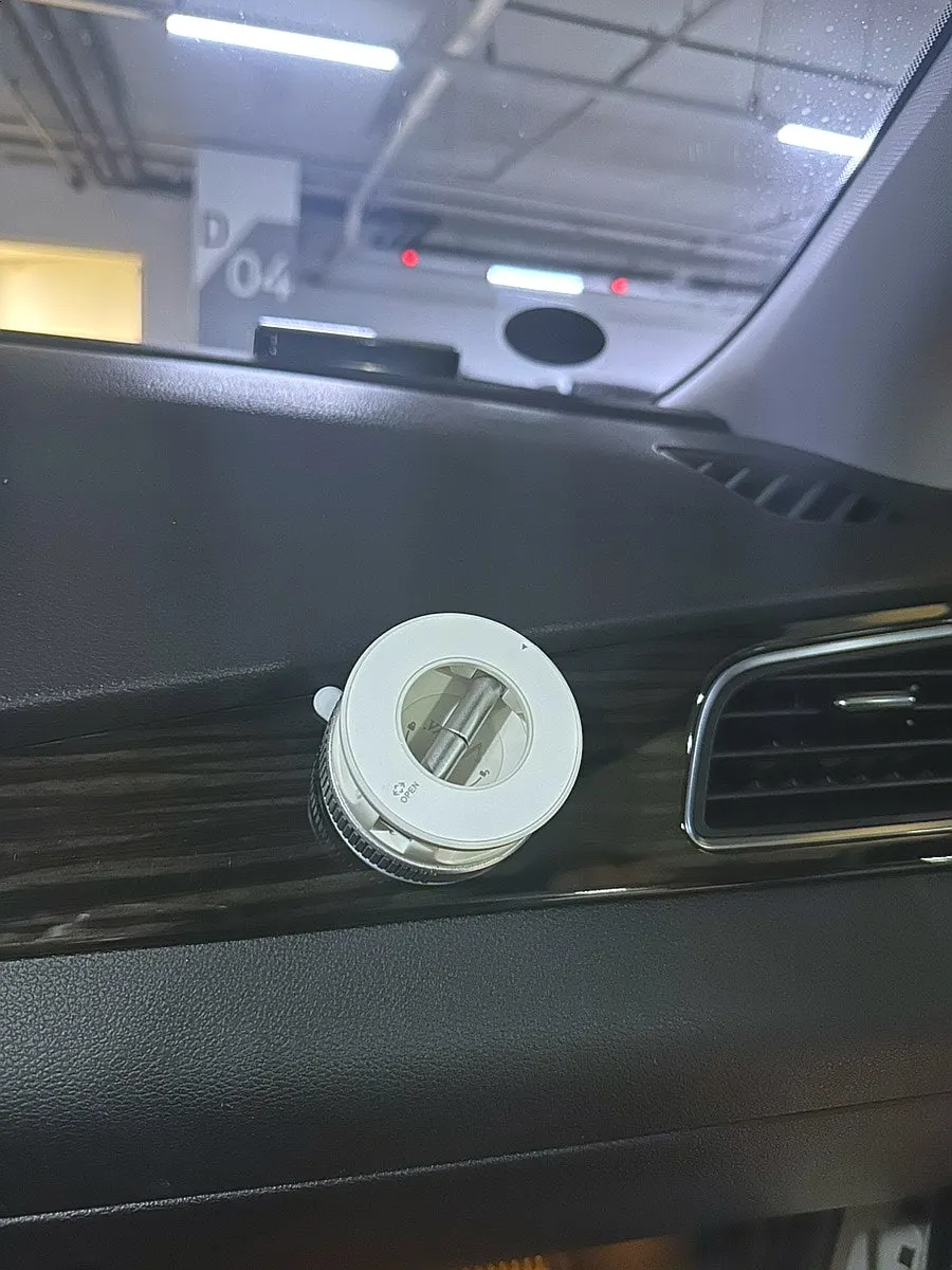 MagSafe phone holder attached in a car