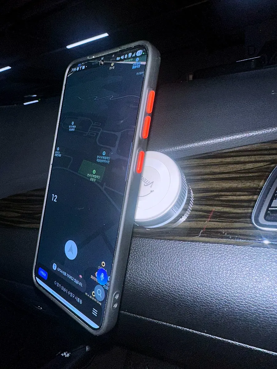 Phone holder in use inside a car