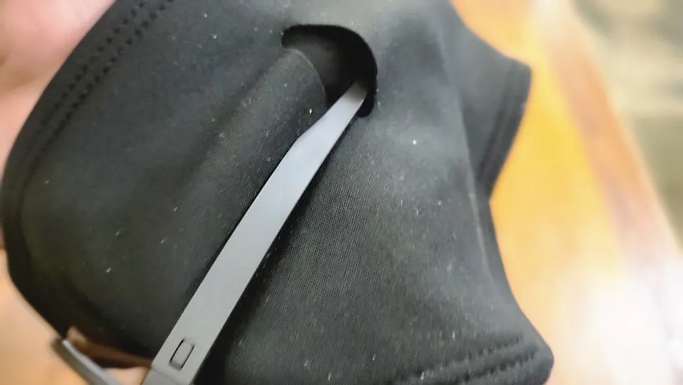 Ear warmers with slots for wearing sunglasses