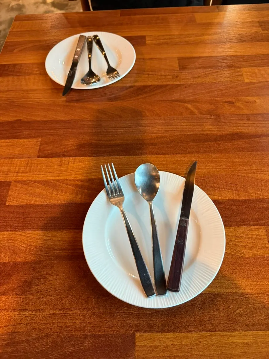 Choosing from the Rustic Smoke House menu