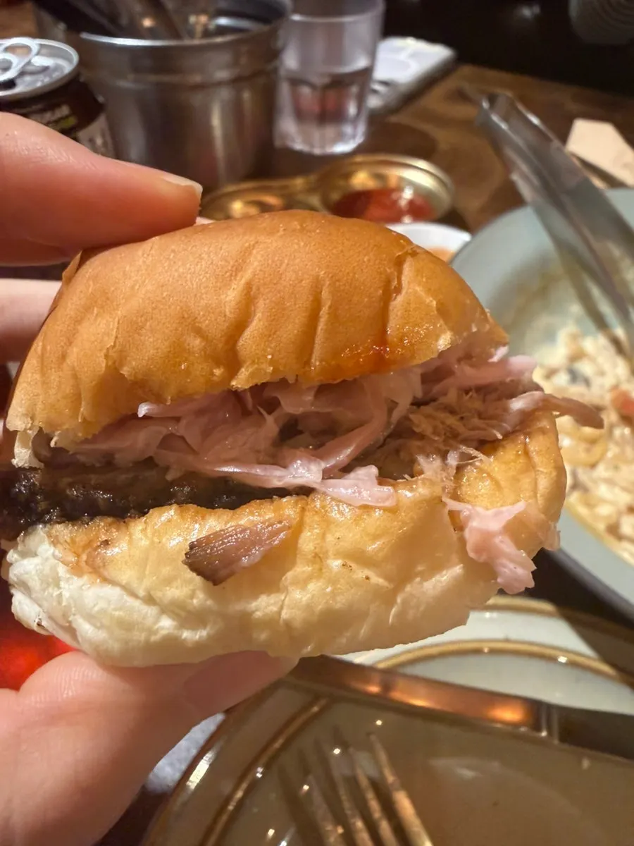 Butter roll sandwiched with meat and coleslaw