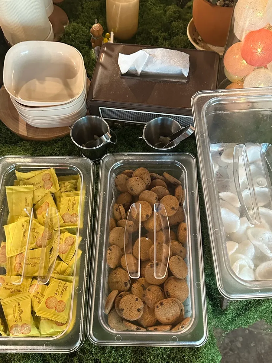 Self-serve bar with dishes and snacks