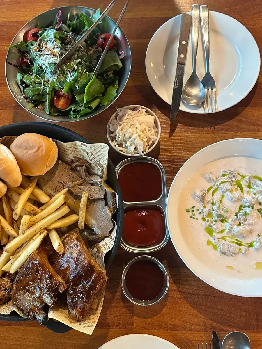 Full spread with BBQ platter and myeongnan-ongsimi