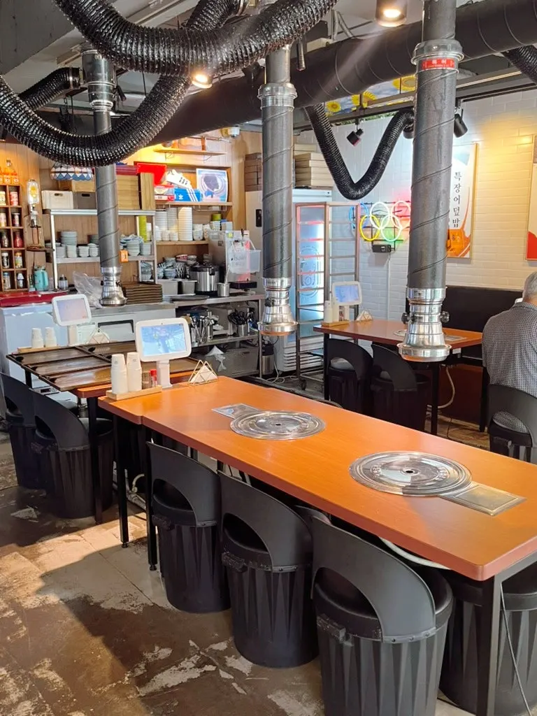 Wall featuring proof of a TV feature on the restaurant