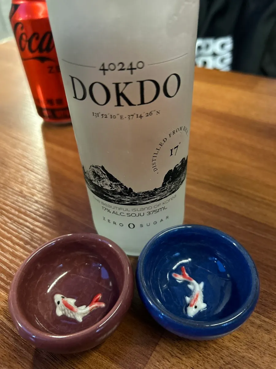 Zero-sugar cola served with a stainless-steel ice cup