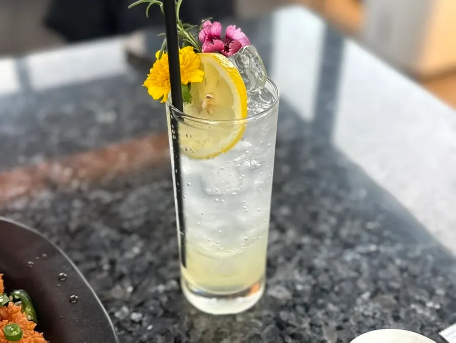 A glass of lemon squish with a fresh, bright look