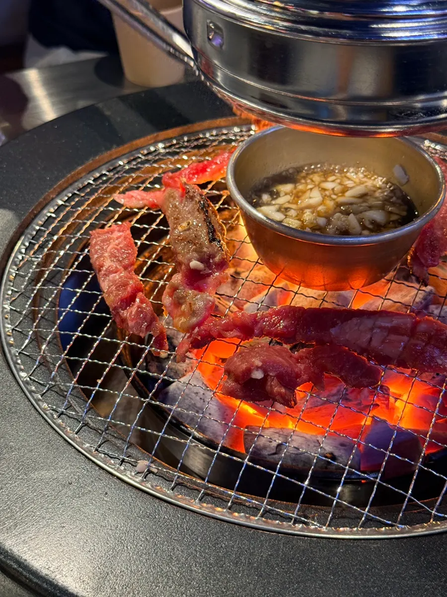 Galbisal cooking over strong charcoal heat
