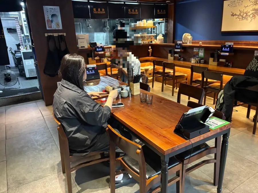 Overview of the calmly lit restaurant interior