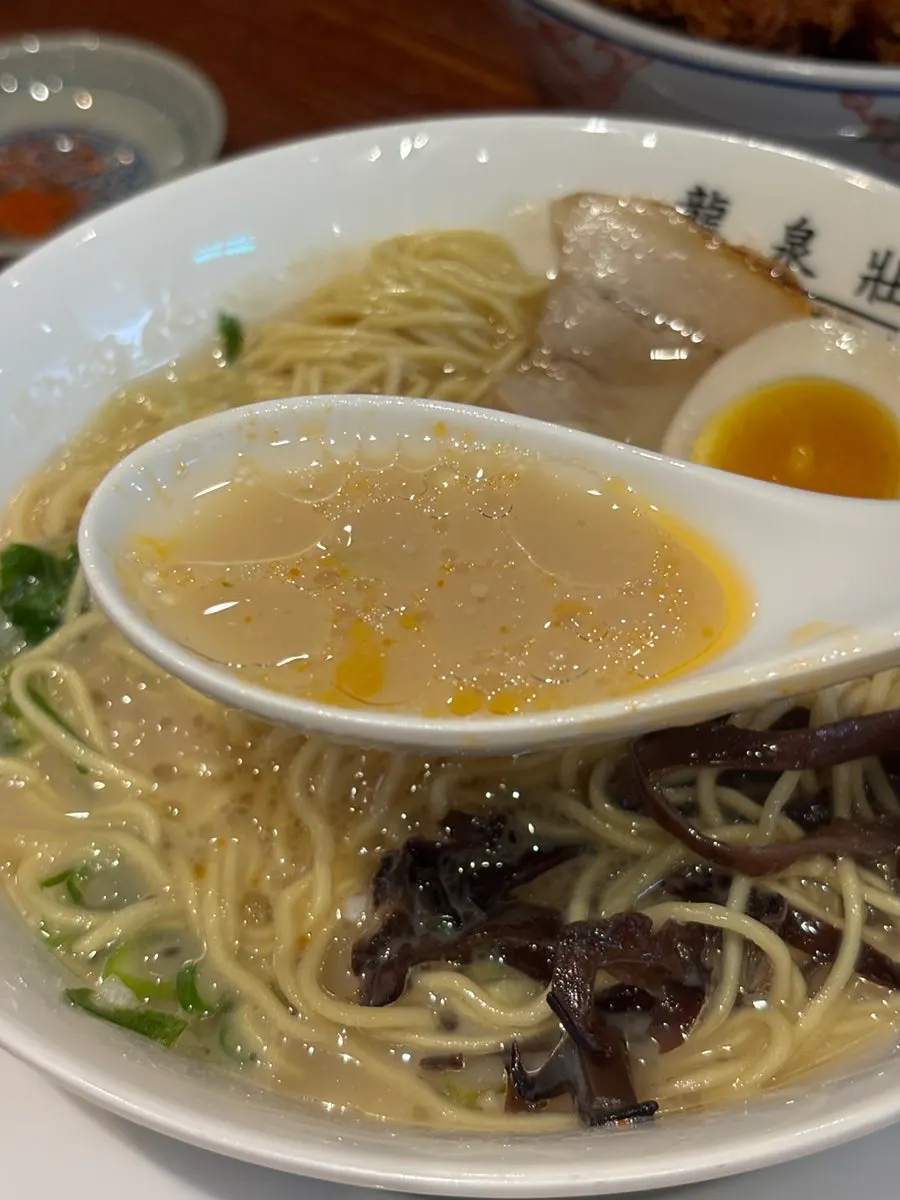 Rich tonkotsu broth with wood ear mushroom garnish