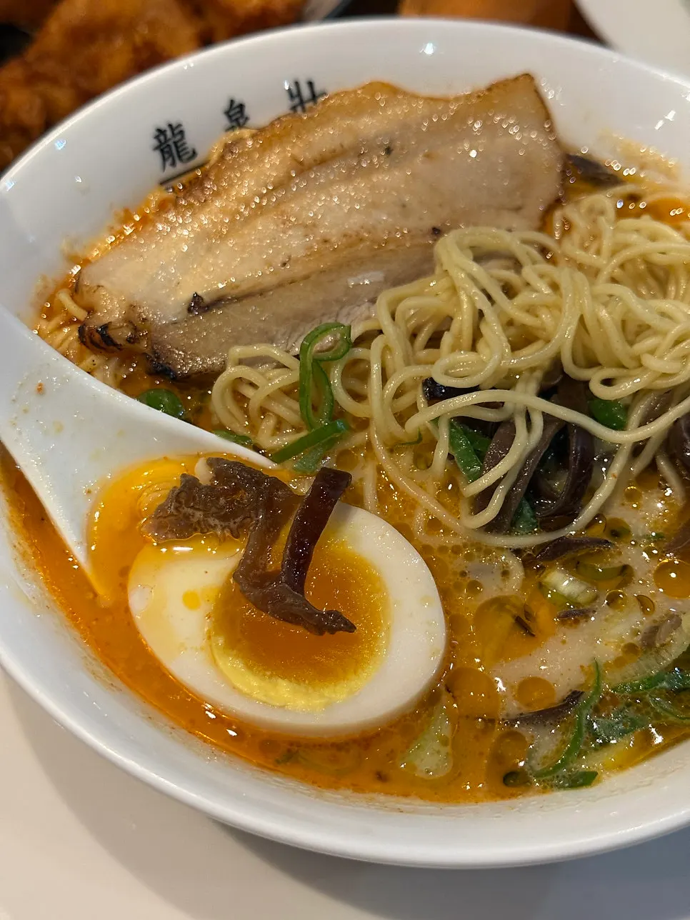 Kara ramen broth with minced garlic and pepper added