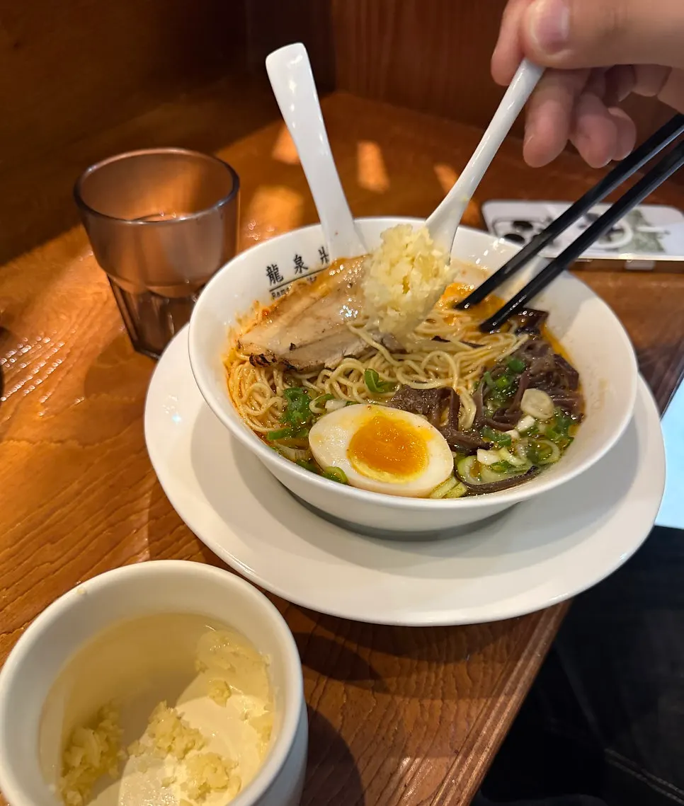 Noodles and chashu in the sharpened spicy tonkotsu ramen