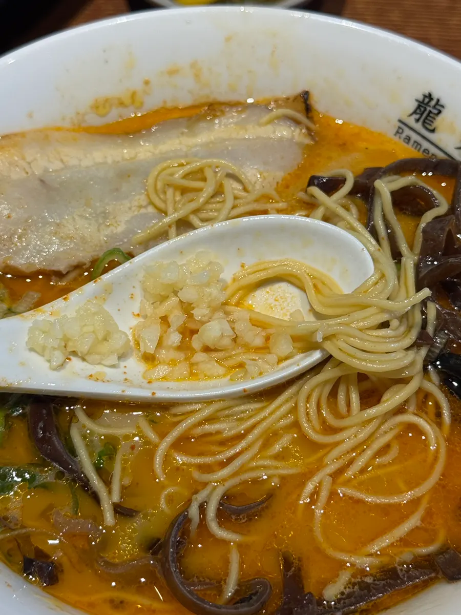 Kara ramen broth with added minced garlic