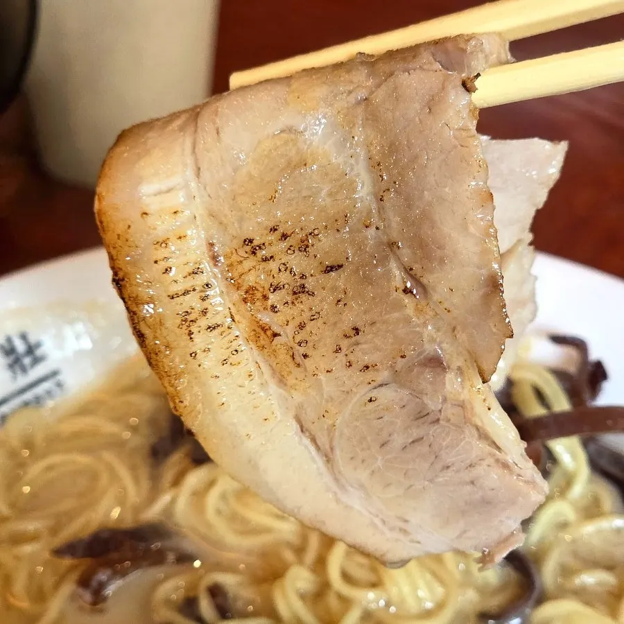 A bowl of Ryusenso ramen topped with toppings