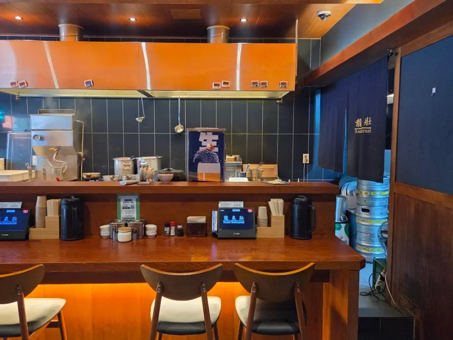 Interior of Ryusenso with a view of the open kitchen