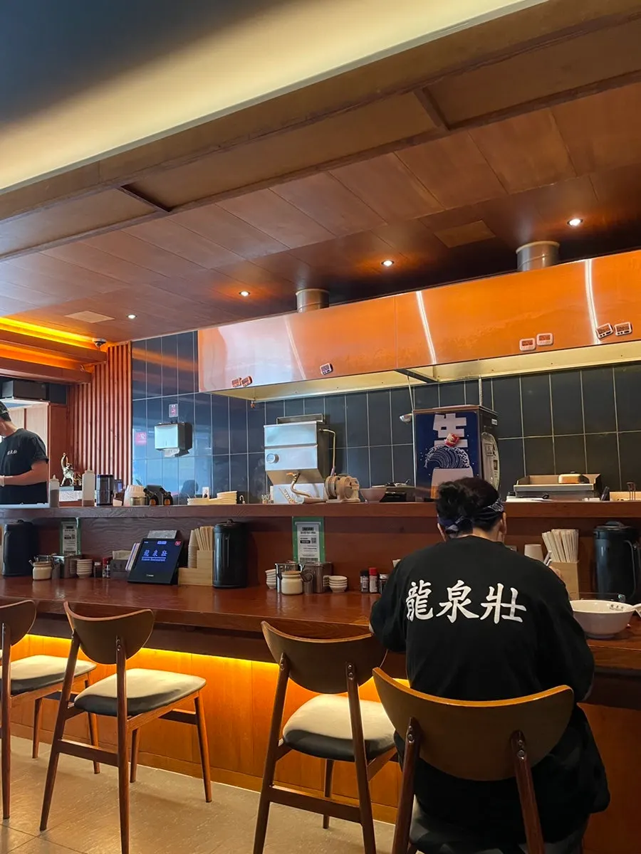 Seating inside Ryusenso with a charging barcode