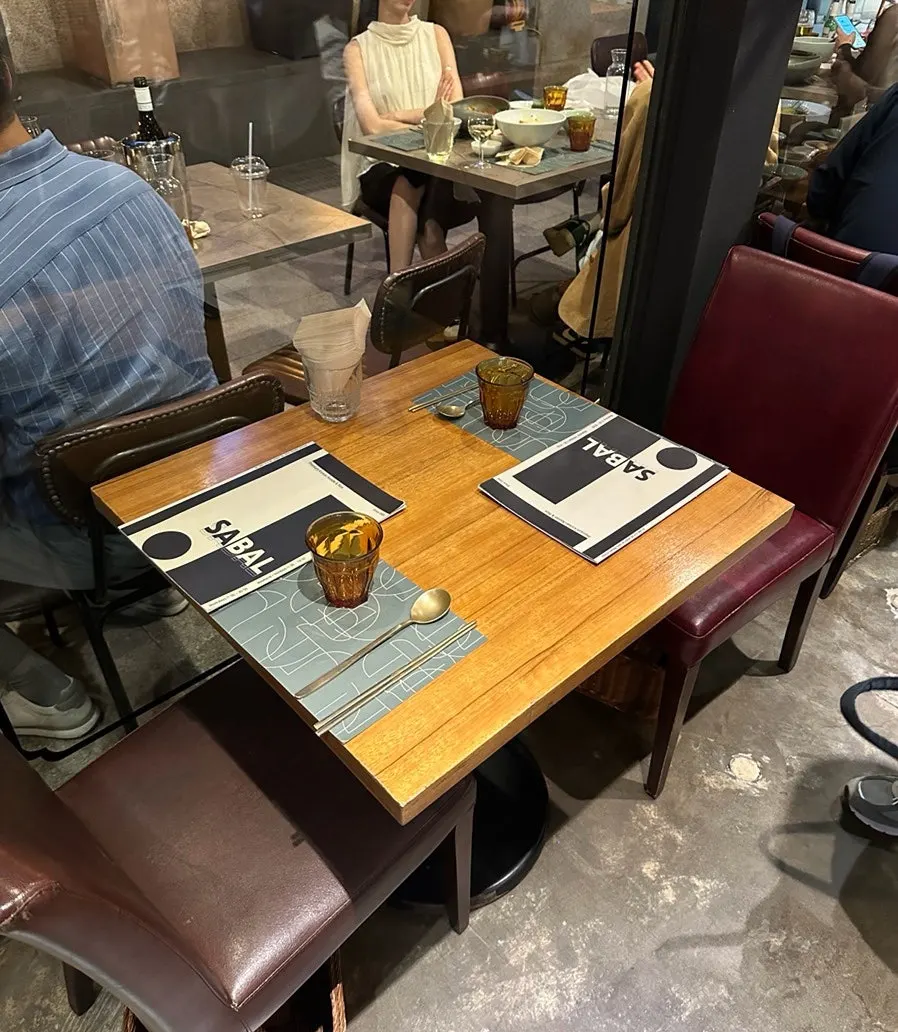 SABAL window seat for two, reserved for dinner