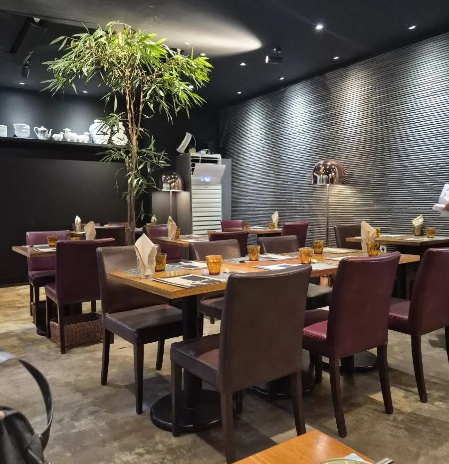 Restaurant space with ceramic objects and soft lighting