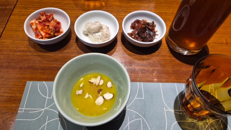 Cold sweet pumpkin porridge and side dishes served before the meal