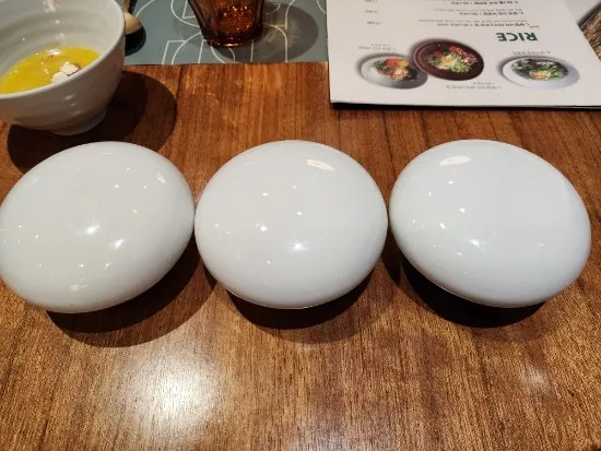 Yellow pumpkin porridge served before the meal