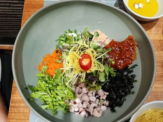 Tangtang octopus deodeok gochujang rice topped with egg strips
