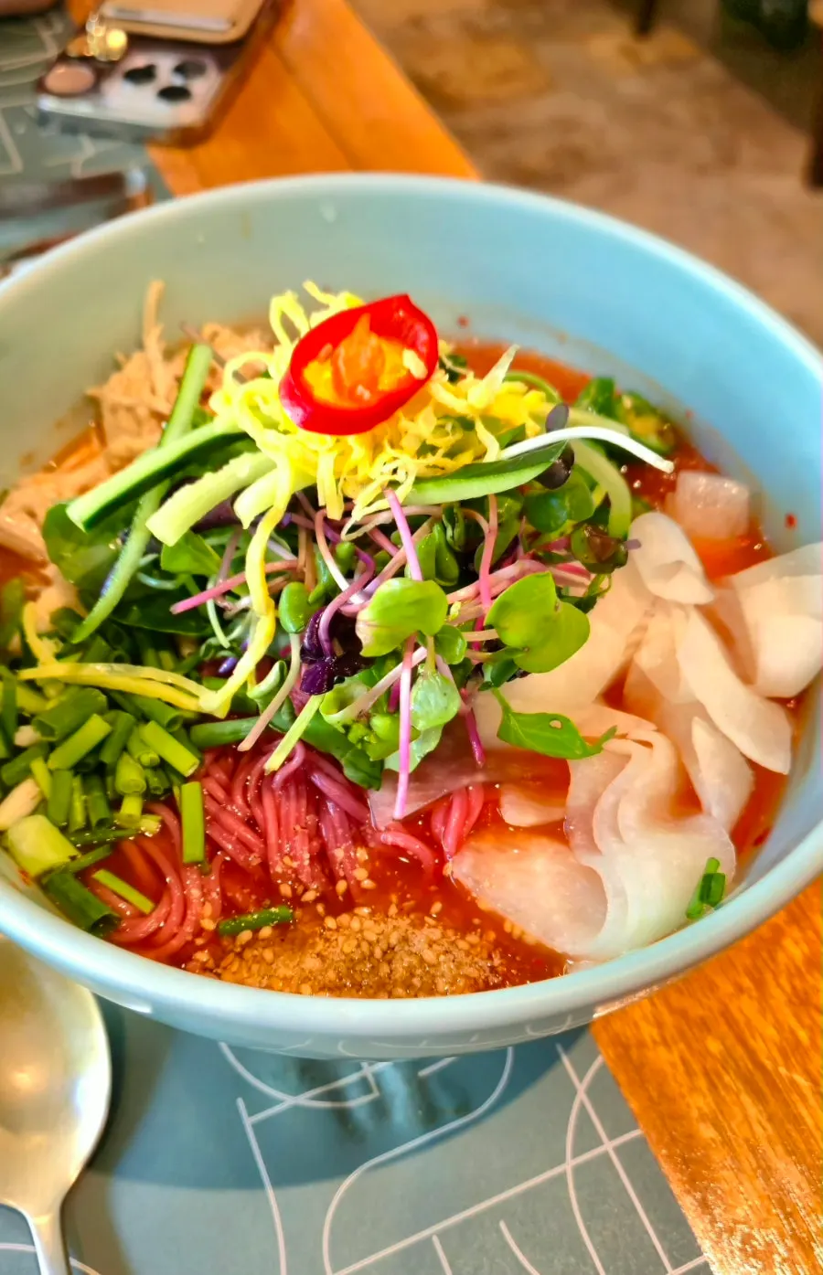 A bowl of SABAL's cold red vinegar chicken noodles