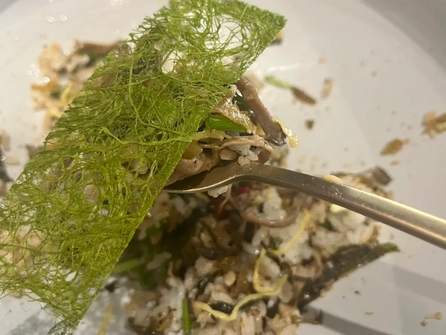 Gamtae perilla oil rice with mushrooms and egg garnish