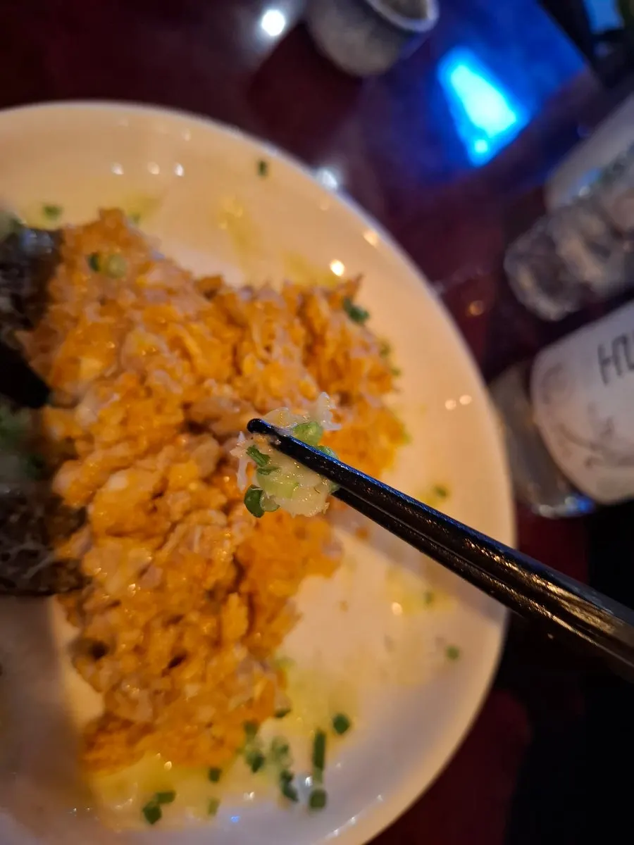 Seasoned sauce and cheese with ankimo maki