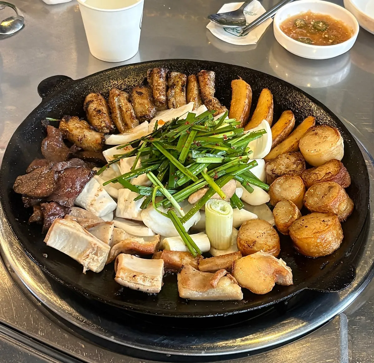 A full spread of pre-grilled assorted gopchang