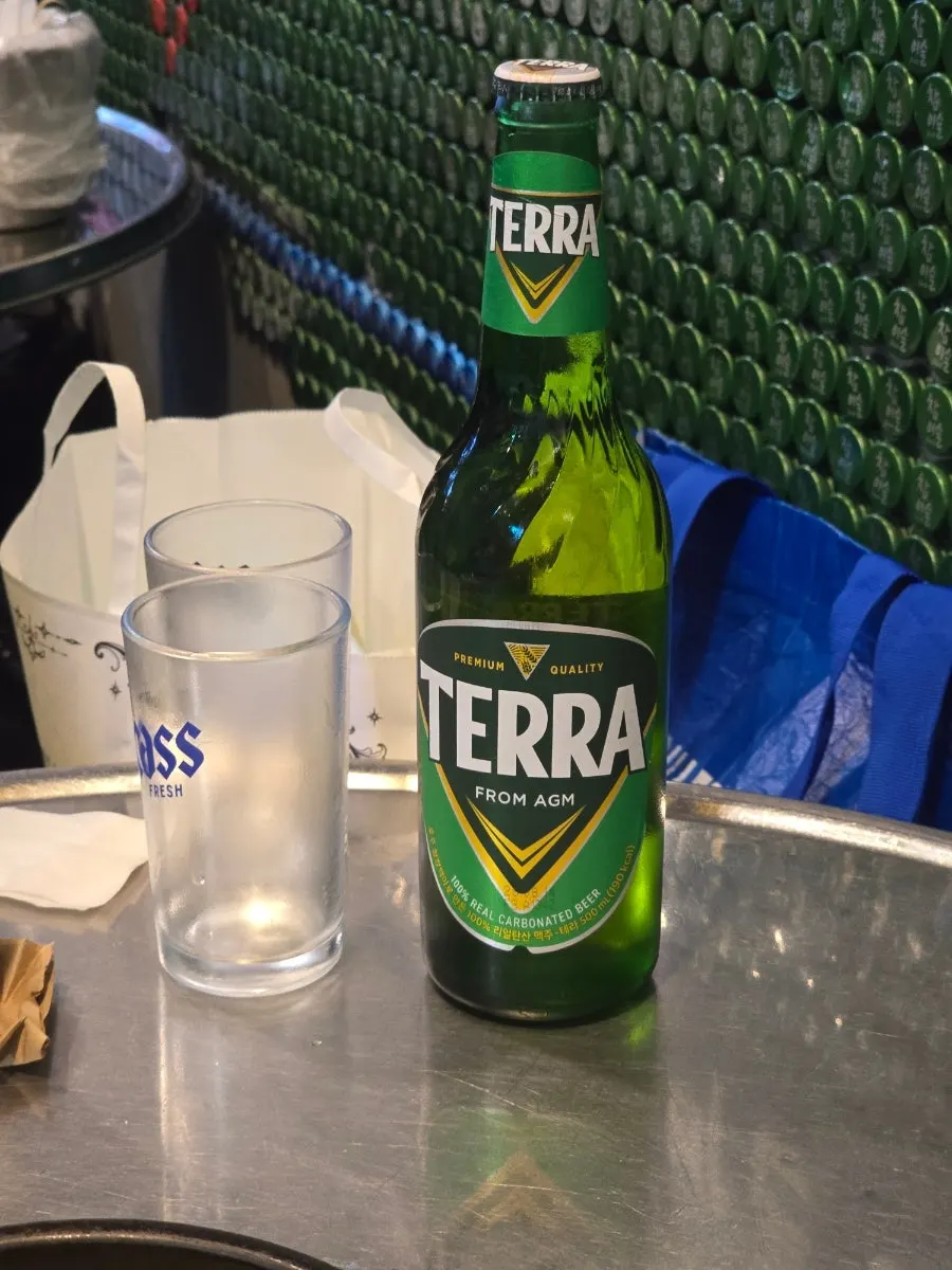 A cold glass of beer poured
