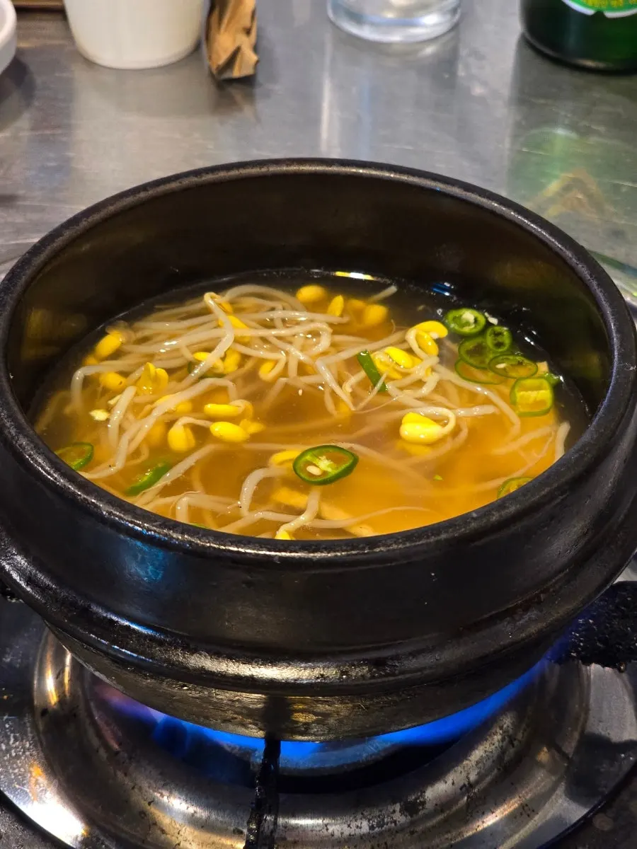 Spicy bean sprout fish cake soup served as a default side