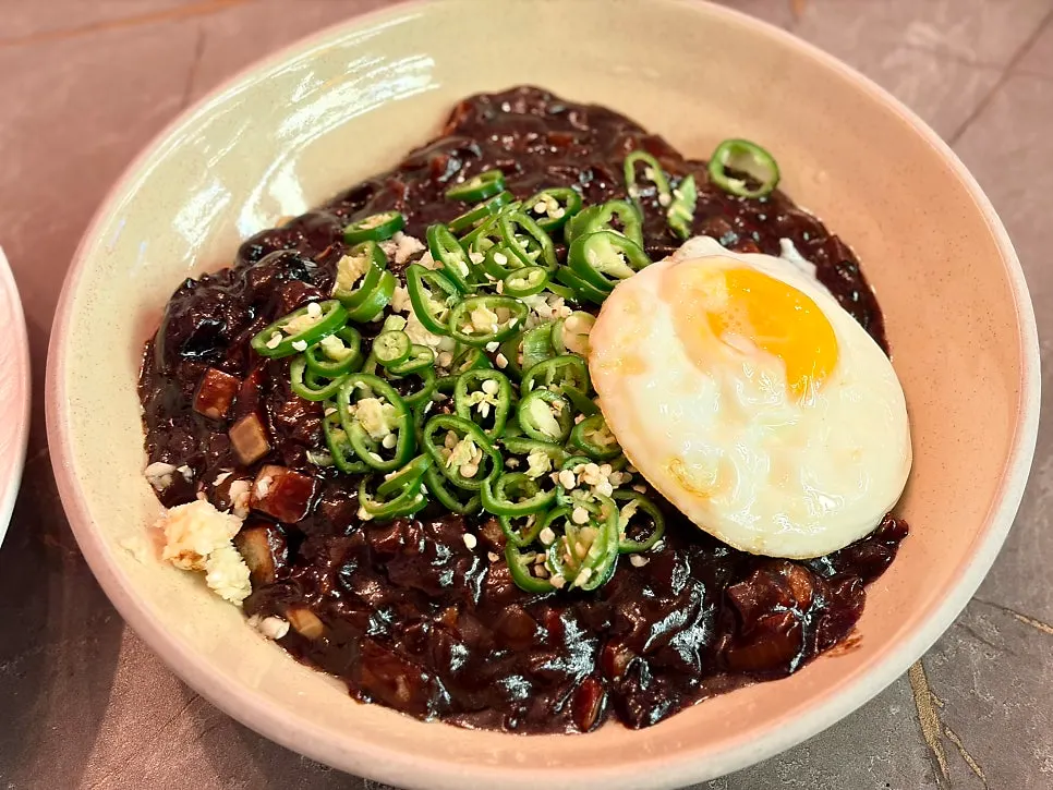 Gochu-jjajang topped with a fried egg
