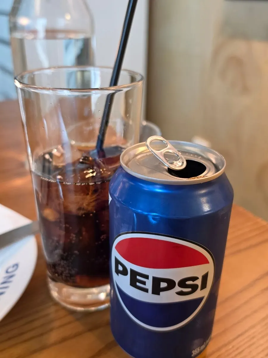 Cola ordered with cream pasta