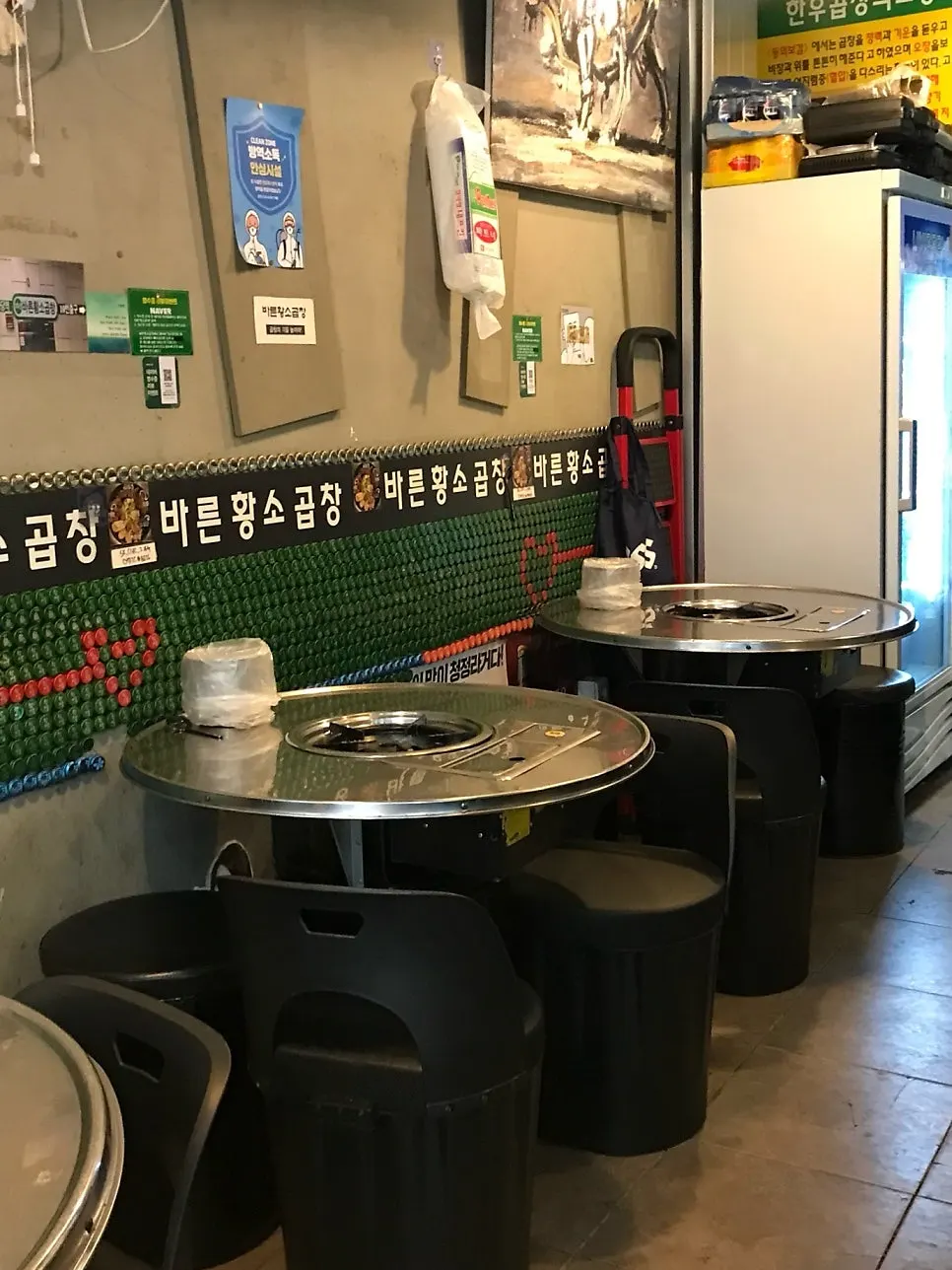 Interior with tables pushed together to make group seating