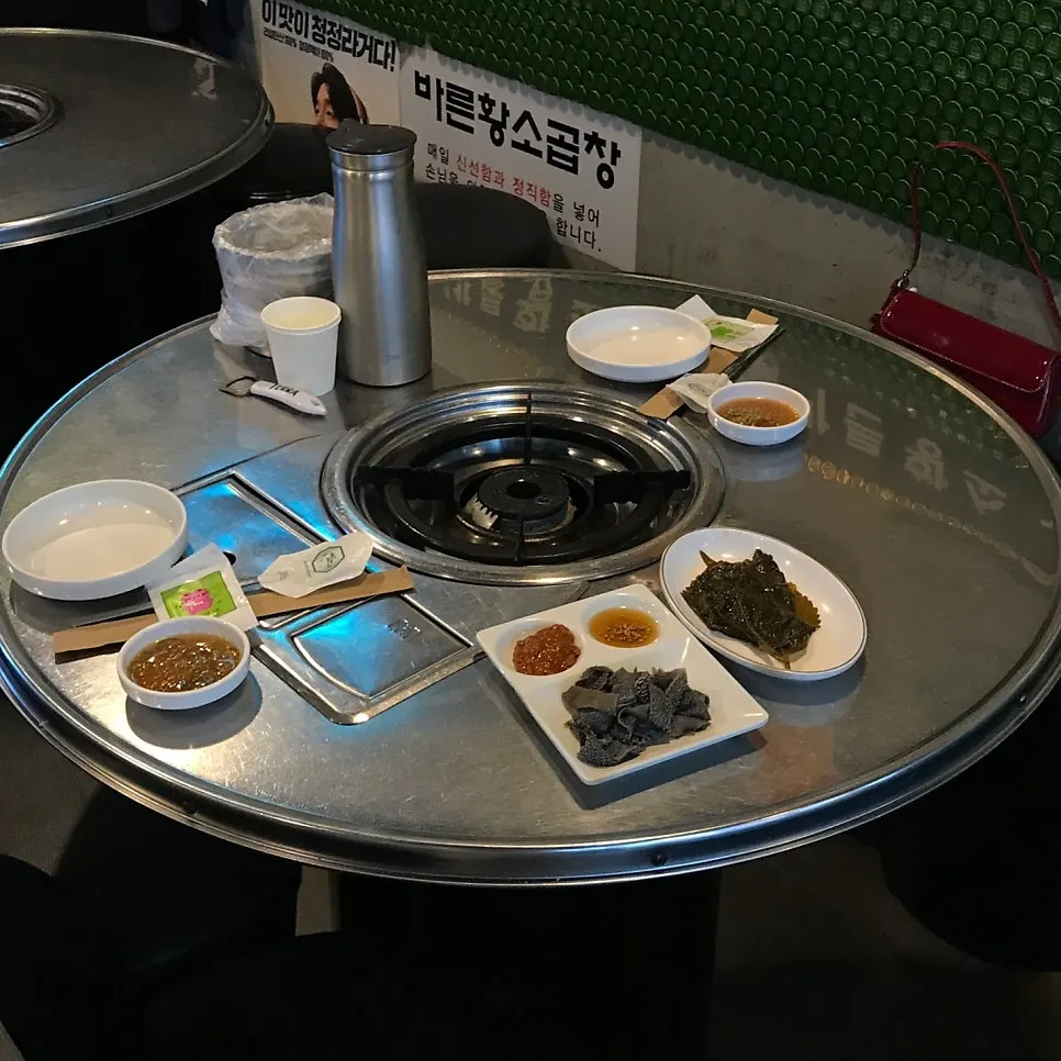 Basic table setup with tripe, perilla leaf sauce and sesame oil sauce