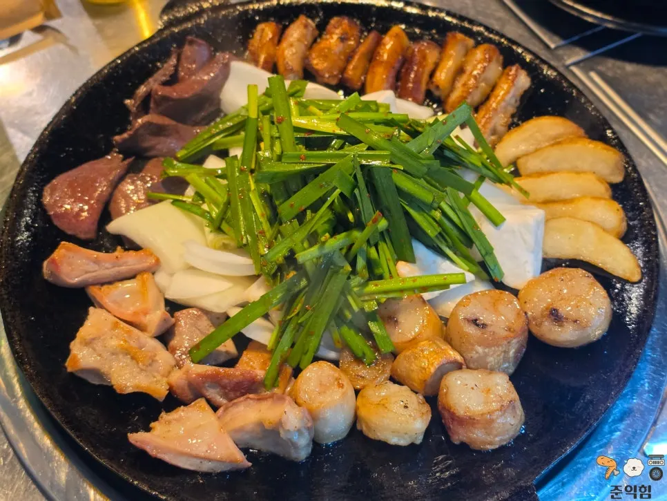 Assorted gopchang for two piled high on the hot plate
