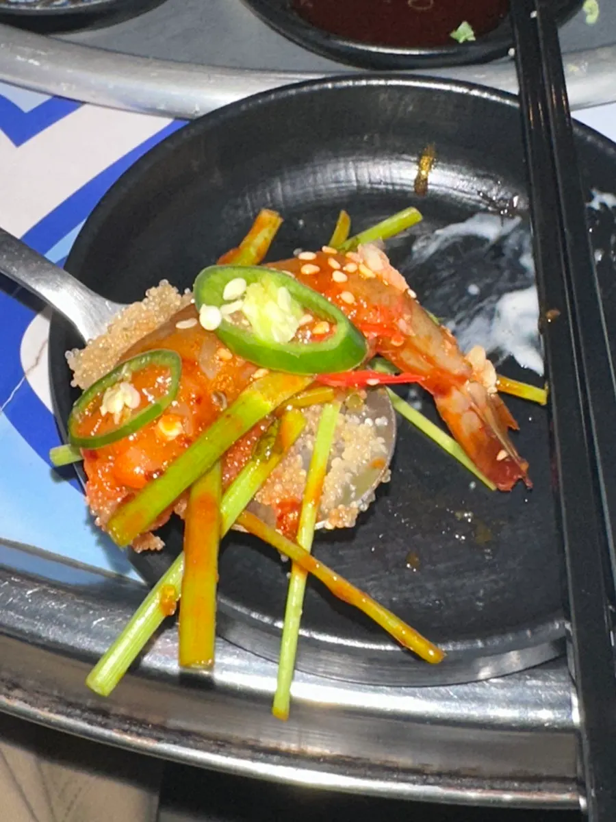 Slushy frozen soju paired with raw shrimp