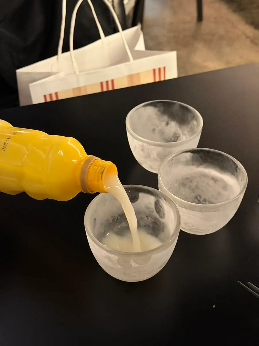 Jeju tangerine makgeolli with the lid opened