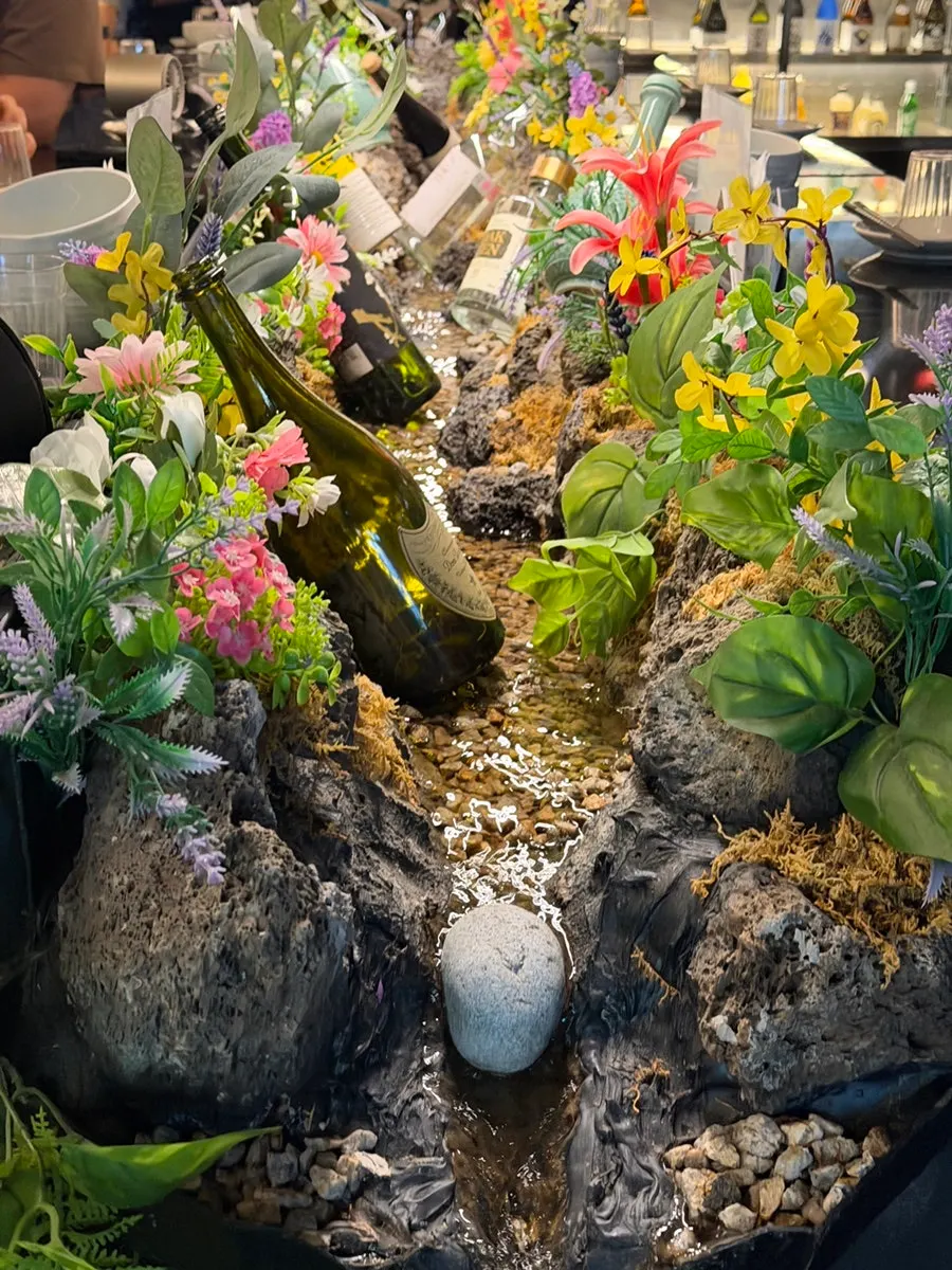 Restaurant waterway with waterfall décor