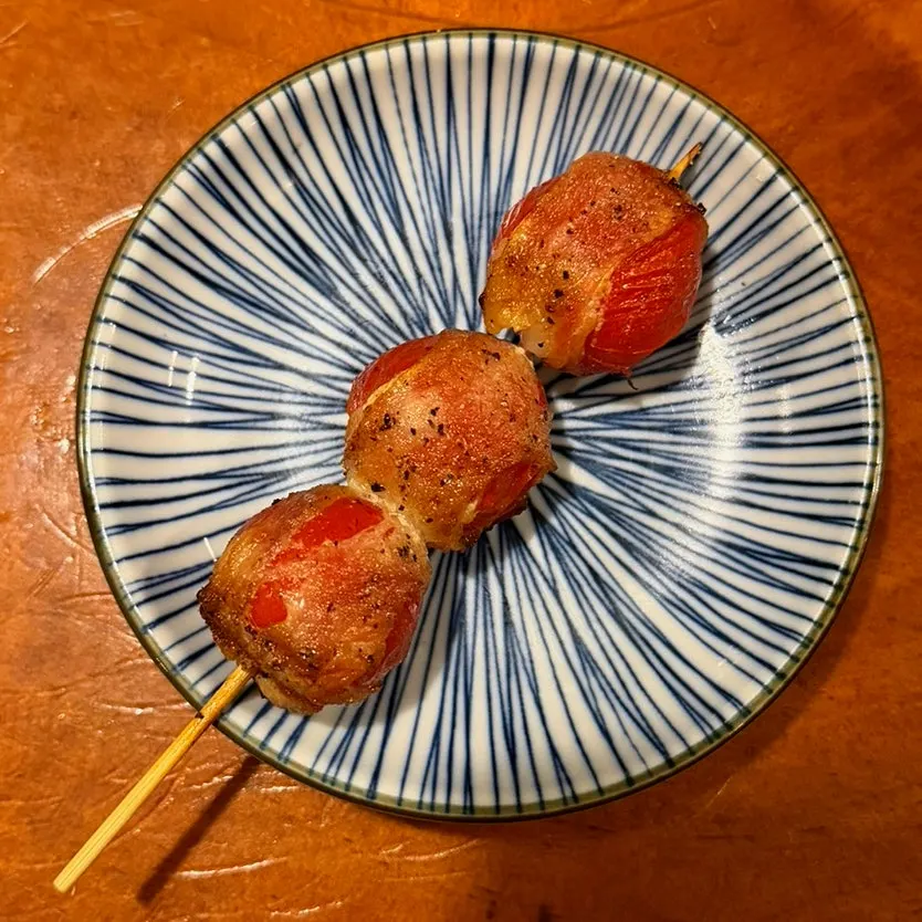Assorted skewers served with a highball