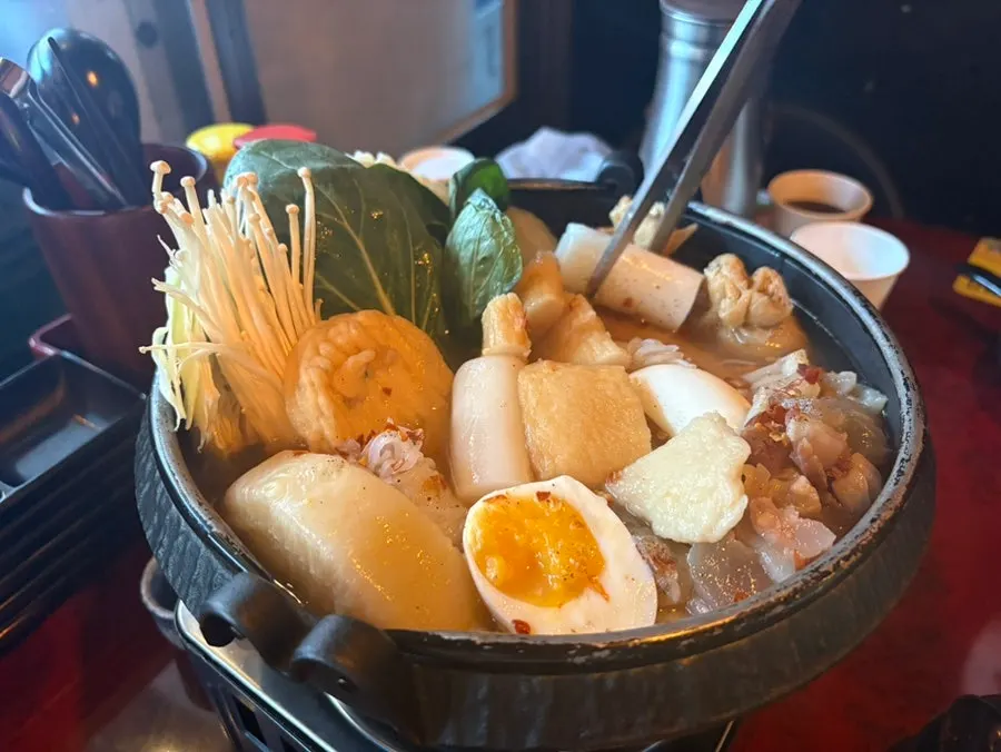 Hot pot filled with fish cakes and beef tendon
