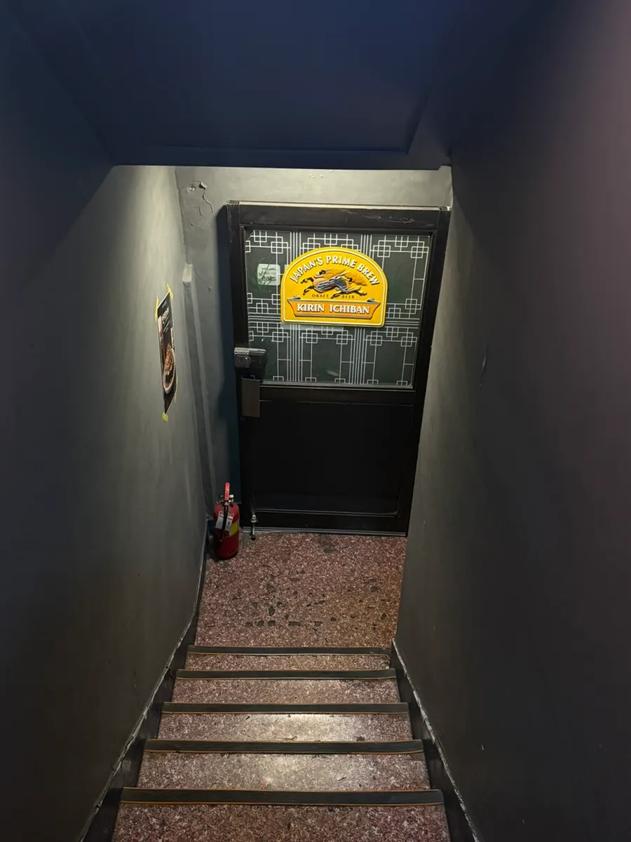 Stairs leading down to the basement floor at Susan