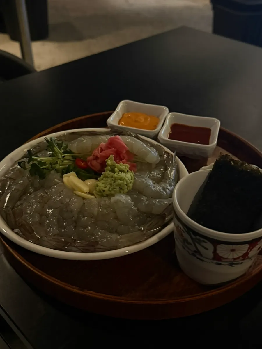 A plate of seasonal raw shrimp sashimi