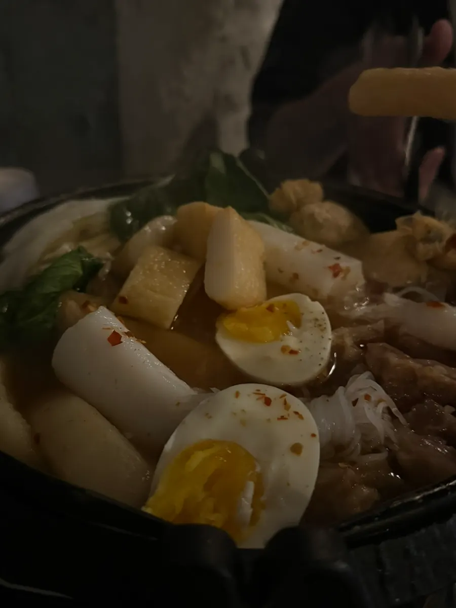 A thick piece of fish cake lifted from the seoji-oden pot