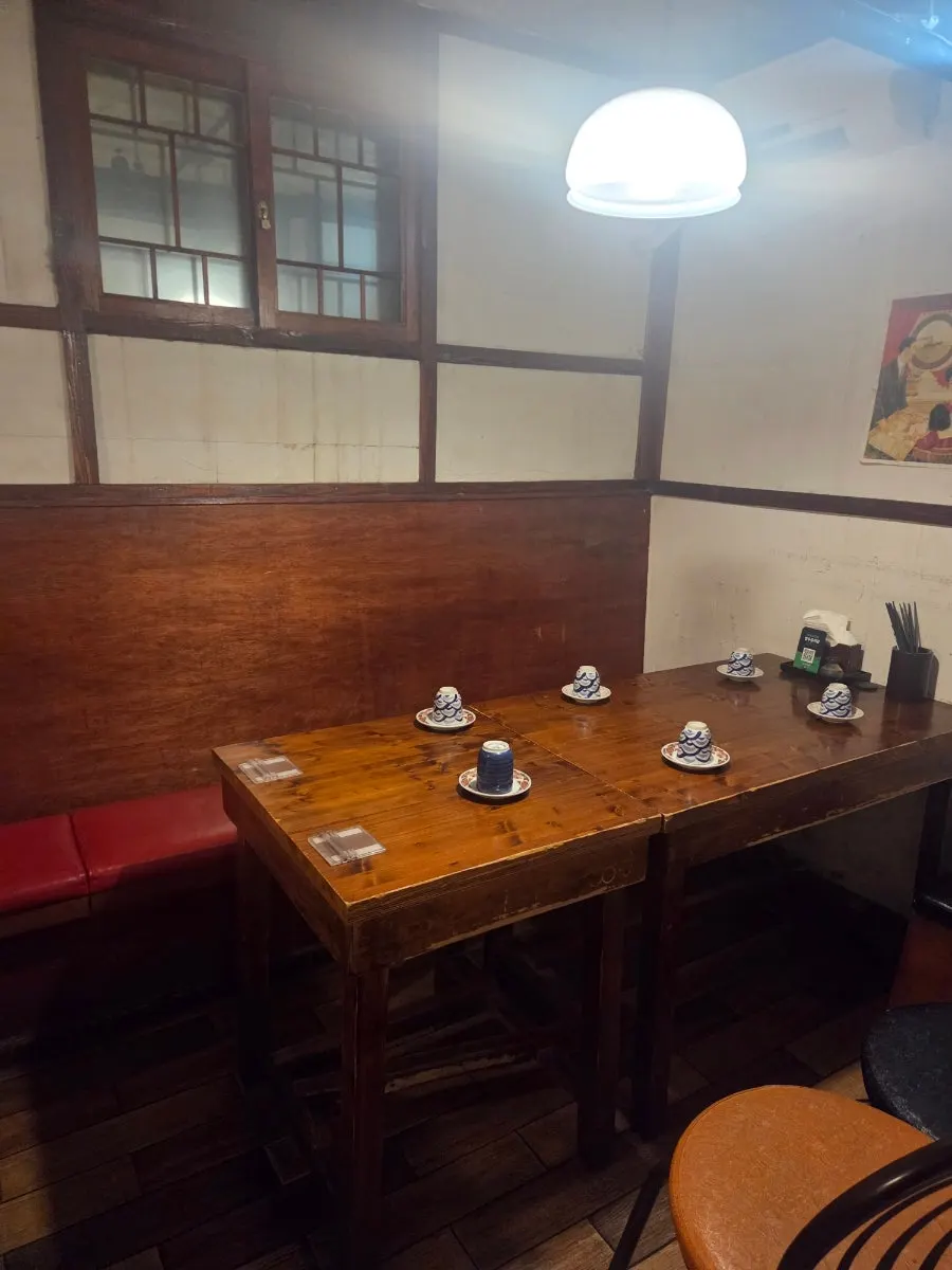 Beer and anju on the table at Gyeongseong Sanghoe