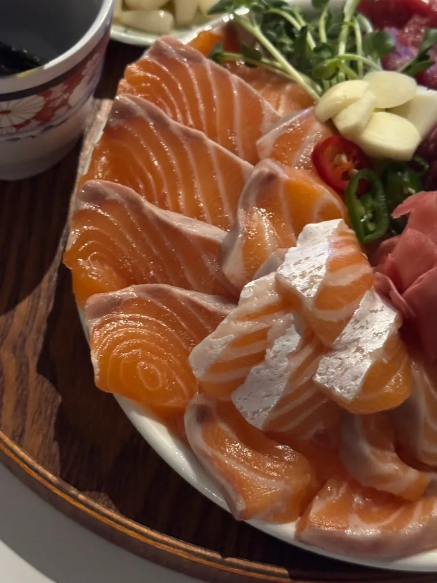 Close-up of orange-toned salmon sashimi